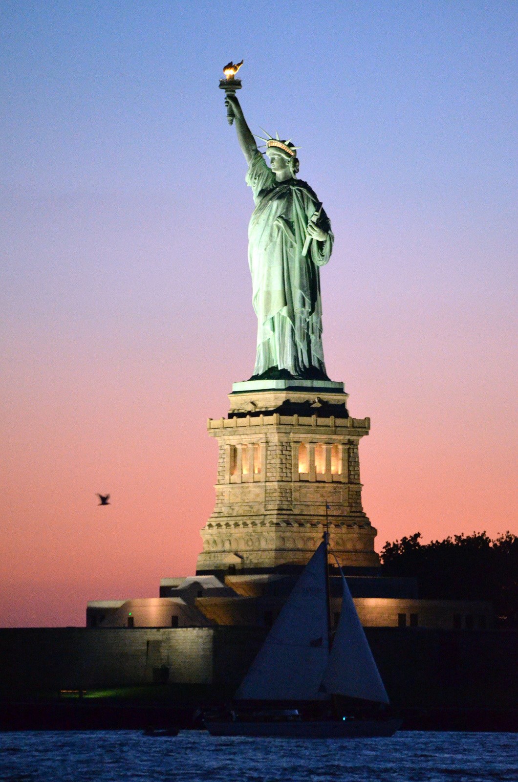 statue of liberty at dusk