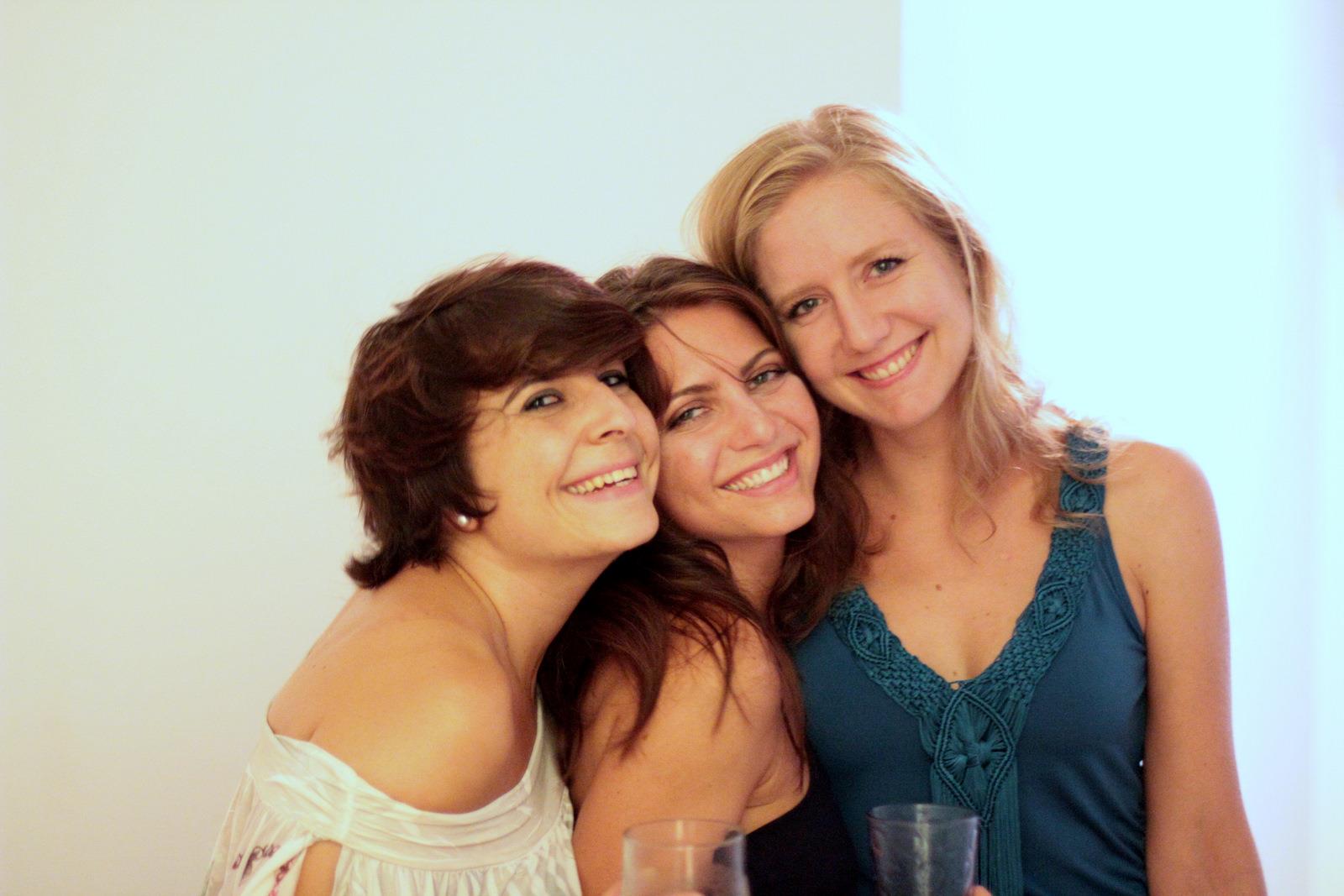 three young women wearing nice outfits and